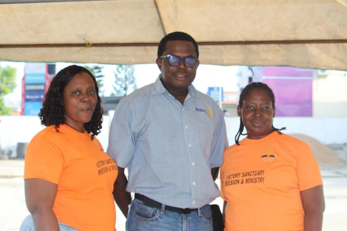 Members of the Mission and Ministry team in orange shirts