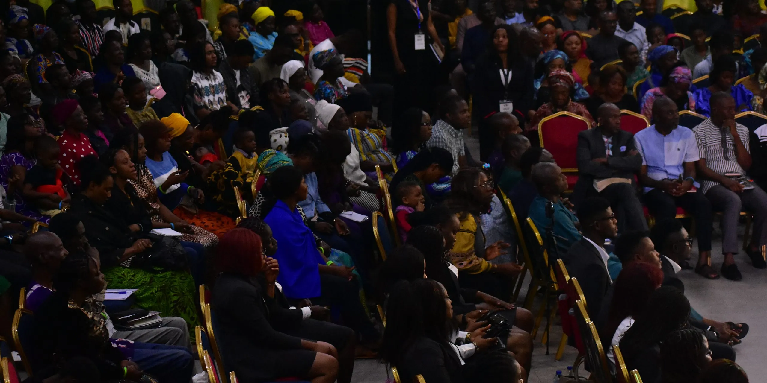 A full congregation seated in the sanctuary during a service