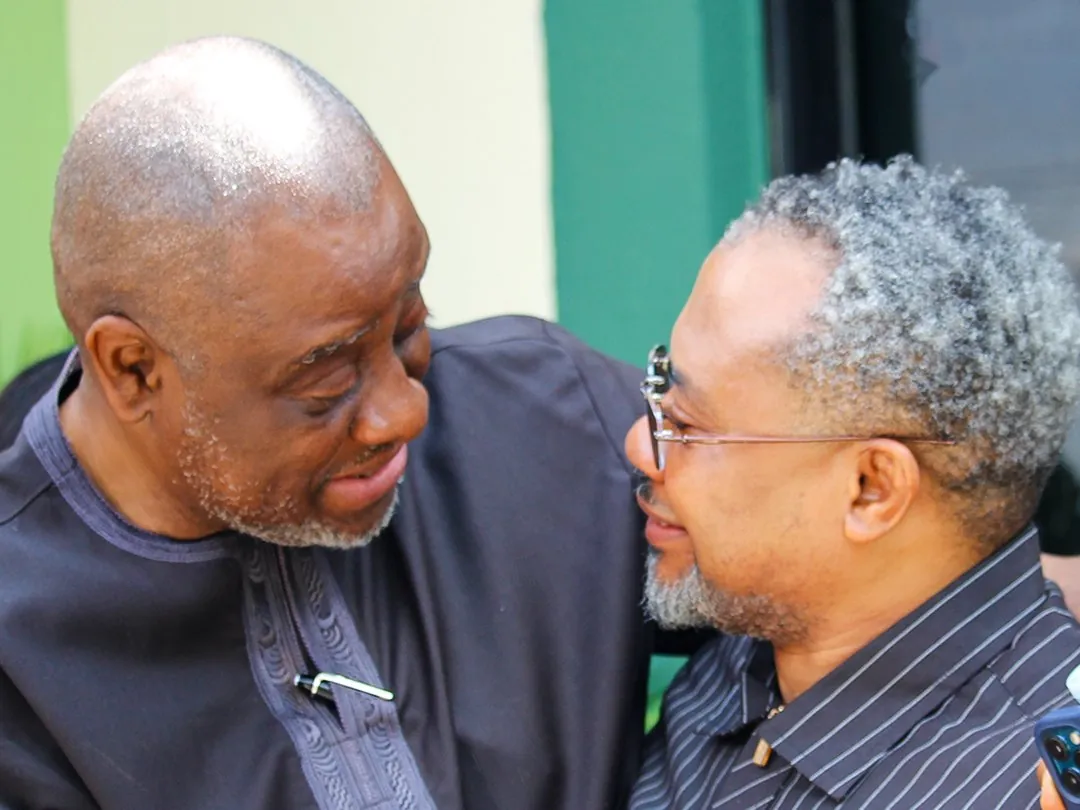 Two brothers embracing outside the church